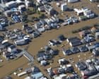 At least four people killed in Japan as typhoon Dujuan triggers heavy rain, landslides