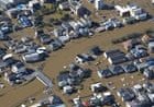 At least four people killed in Japan as typhoon Dujuan triggers heavy rain, landslides