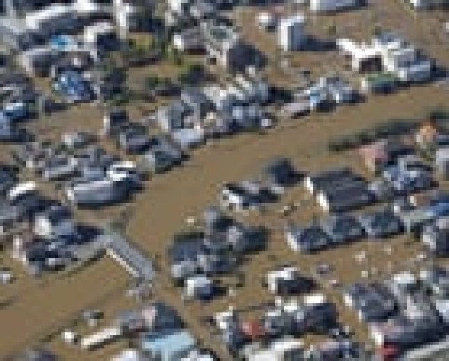 At least four people killed in Japan as typhoon Dujuan triggers heavy rain, landslides