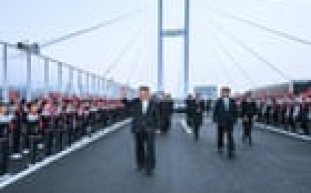 Kim Jong-un crosses newly opened bridge into China
